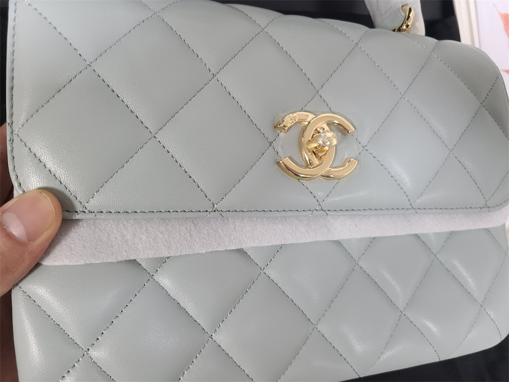 Ch*el flap bag with top handle 6.6 × 9.8 × 4.7 in